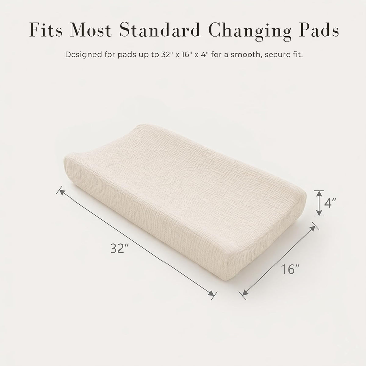 Changing pad cover in cream/off-white textured muslin fabric shown on a contoured pad. Dimension arrows indicate 32" long x 16" wide x 4" tall. Text reads 'Fits Most Standard Changing Pads.'