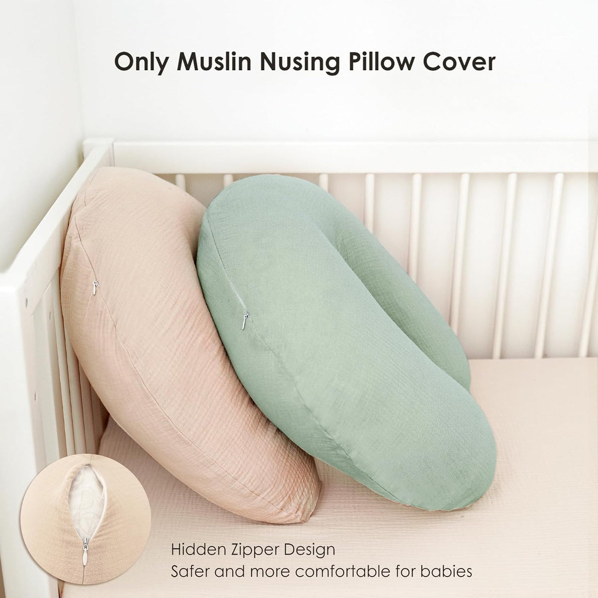 Two crescent-shaped muslin nursing pillow covers leaning against a white crib -- one sage green, one blush pink -- both showing a hidden zipper. Inset close-up highlights the zipper closure. Text reads 'Only Muslin Nursing Pillow Cover' and 'Hidden Zipper Design, Safer and more comfortable for babies.'
