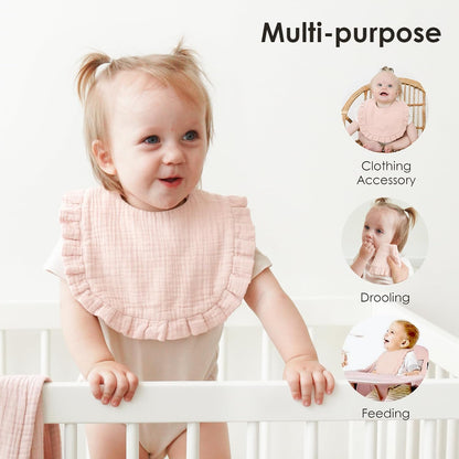 Toddler wearing a soft pink ruffled muslin bib while standing at a white crib. Text reads 'Multi-purpose' with three circular inset photos showing the bib used as a clothing accessory, for drooling, and during feeding.