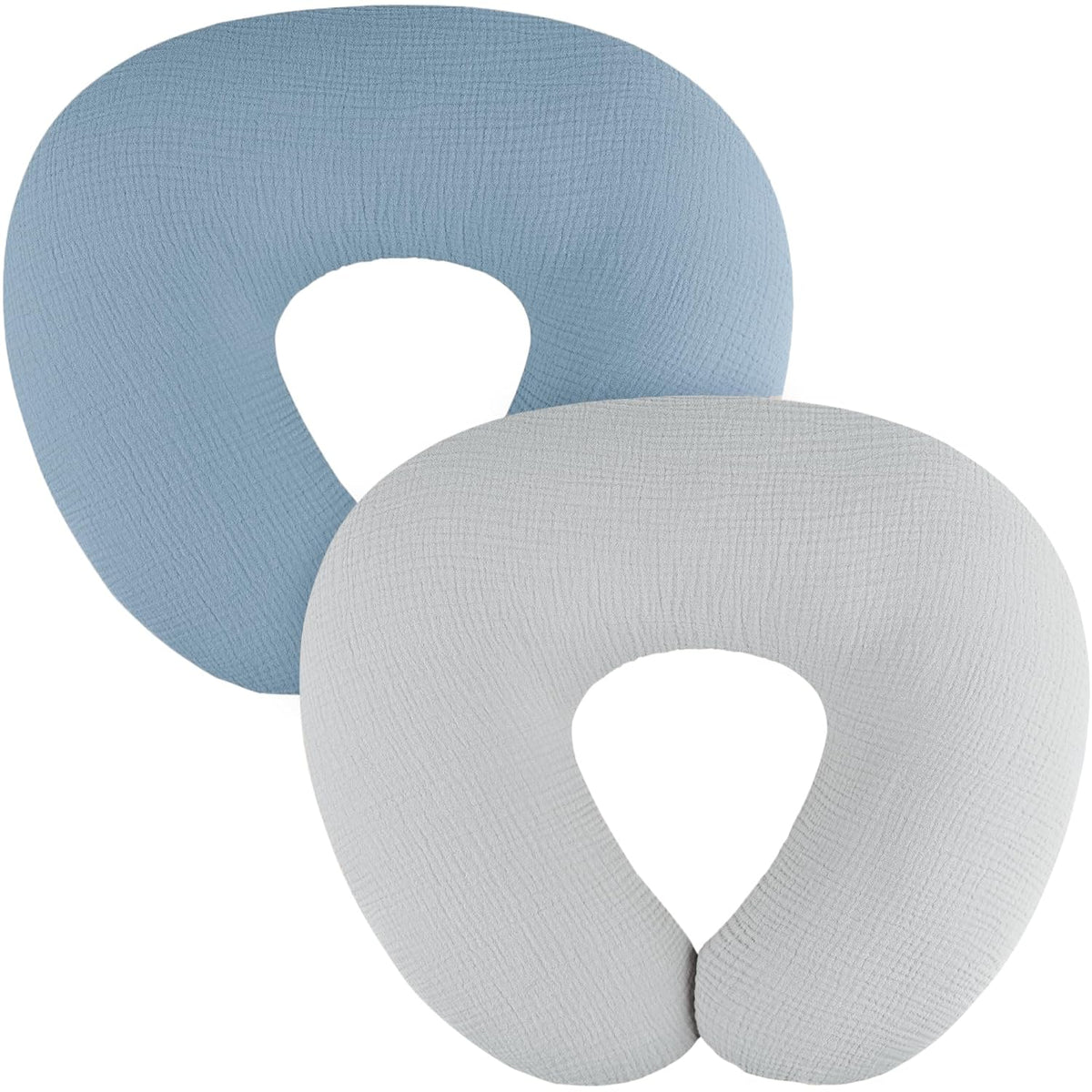 Two U-shaped nursing pillow covers shown overlapping on a white background. The back cover is dusty blue and the front cover is light gray, both with a subtle woven muslin texture.