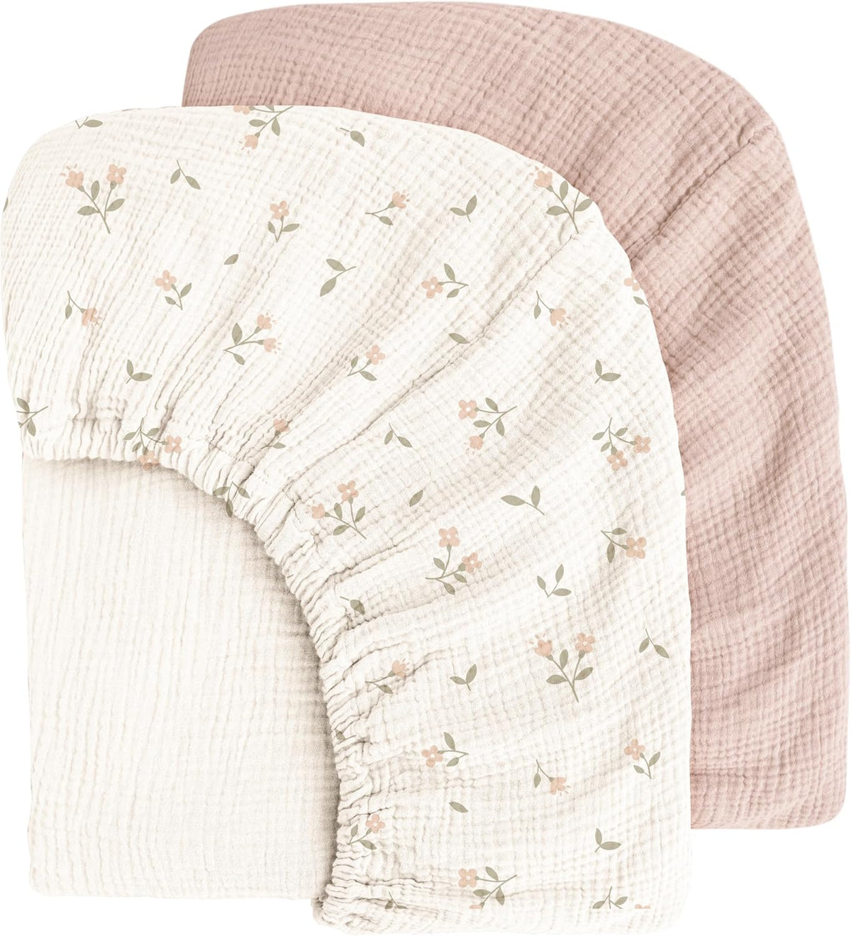 Three muslin cotton fitted crib sheets layered together: a cream sheet with small floral print in front, a plain cream/white sheet in the middle, and a dusty rose solid sheet in the back. All show visible waffle-weave texture and elasticated edges.